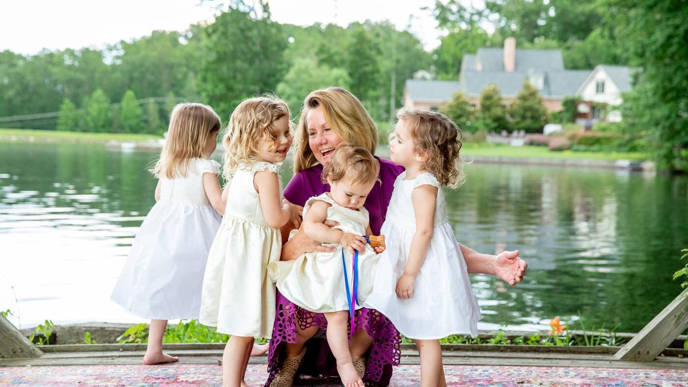 step mother of the bride with four flower girls